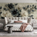Elegant magnolia branch wallpaper as a feature wall in a sunlit  bedroom