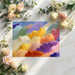 Creative home office workspace with a textured, colorful painterly mural on the back wall