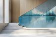 Modern office interior with blue cityscape mural wall behind a desk