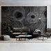 Dramatic living room accent wall with circular black and white line pattern