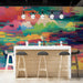 Bar interior with vibrant pixelated landscape wallpaper and dark wood furniture