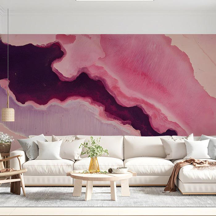 Modern living room with a pink and plum abstract fluid art accent wall behind a white sofa