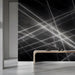 Contemporary reception wall decorated with a sharp white and charcoal abstract ray mural