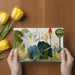 Floral wall mural featuring white and coral lotus flowers in a tranquil home office space