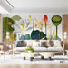 Vibrant garden motif wallpaper applied to a living room wall behind a velvet sofa