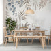 Bamboo and eucalyptus mural featured in a bright, moder dining room