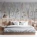 A tranquil bedroom area with botanical meadow wallpaper and soft sunlight filtering through curtains.