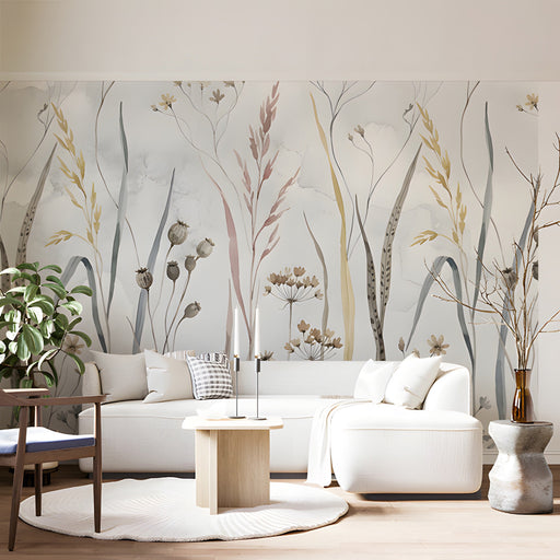 A bright living room featuring a watercolor meadow grass mural wall behind a cream upholstered bed.