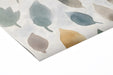 Whimsical leaf patterned wall mural featured in a bright, modern home office space