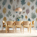 Autumnal leaf wallpaper design in a serene dining room with neutral decor