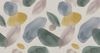 Abstract watercolor mural featuring overlapping organic leaf shapes in sage green, slate blue, and ochre yellow on cream.