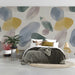 Bohemian style home office with hand-painted look wall mural and natural textures.