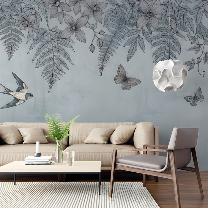 A serene living room with a blue botanical bird and fern mural wallpaper behind a white wooden bed frame