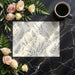Bright kitchen dining area featuring a soft botanical wallpaper with leaf patterns