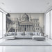 A grand entryway featuring the architectural mural as a backdrop behind a dark wood desk.