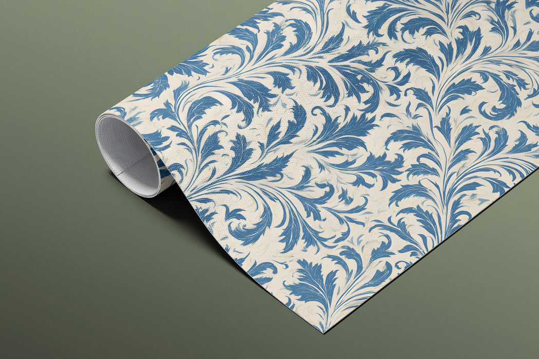 A formal dining room with blue and cream botanical wallpaper and dark wood furniture.