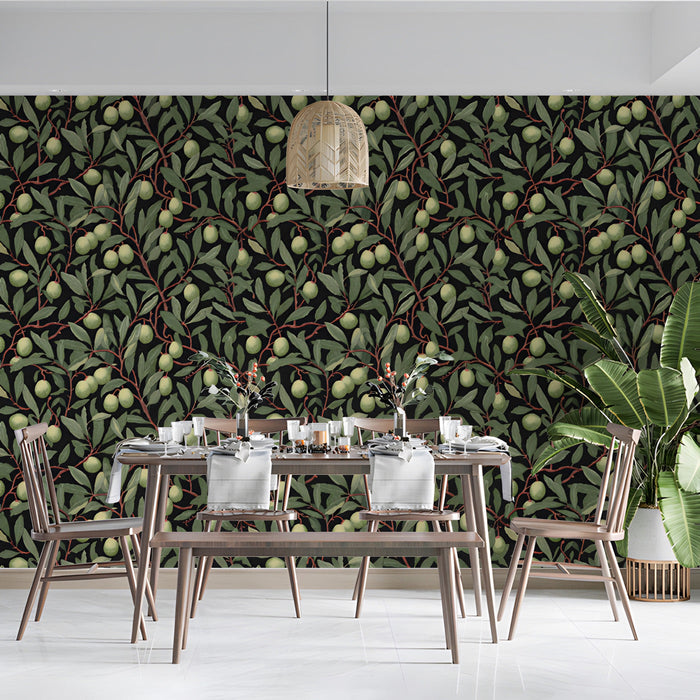 A cozy dining room with olive branch patterned wallpaper and dark oak bookshelves.