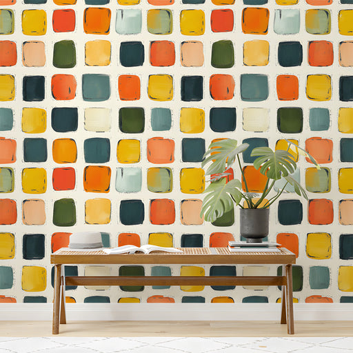 Modern study with a vibrant geometric square mural behind a simple wooden desk