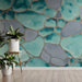 Modern entryway with teal stone segment mural behind a vanity