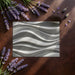 Contemporary home office with a textured wave mural on the main accent wall