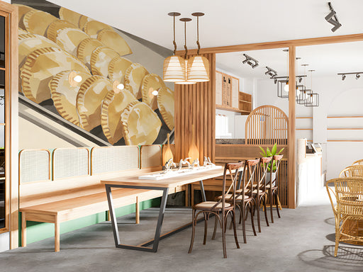 A bright restaurant breakfast nook featuring an empanada mural on the accent wall