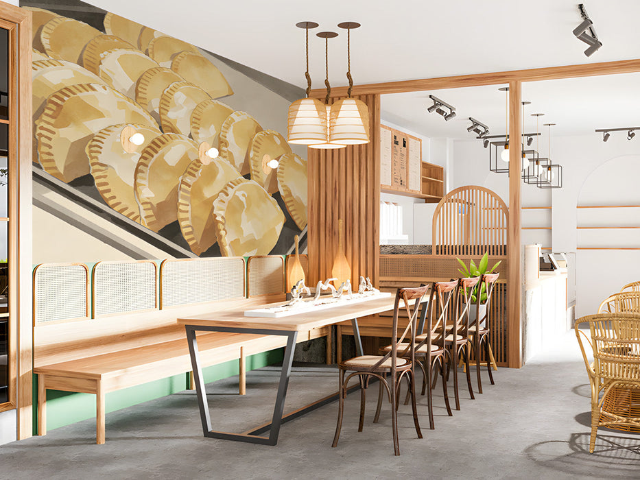 A bright restaurant breakfast nook featuring an empanada mural on the accent wall