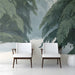 Cozy entryway space styled with a sweeping evergreen tree mural.