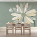 Abstract flower wall mural behind a minimalist dining room console table