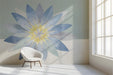 Calming study interior featuring a blue lotus flower wallpaper behind a white wooden bed frame