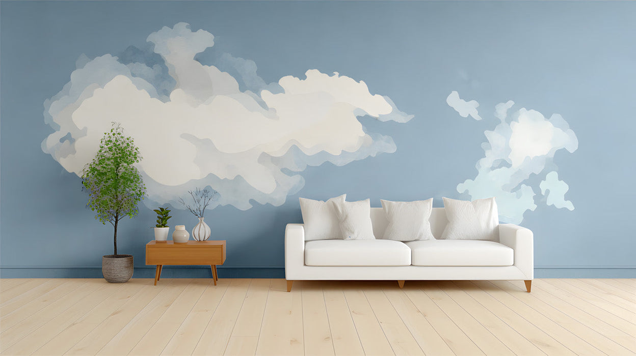 Clouds mural installed on a living room feature wall behind a minimalist bed frame.