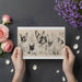 Dog-themed artistic mural wallpaper featured in a cozy entryway with minimalist furniture