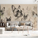 Sepia illustration wall covering in a living room behind a neutral sofa and indoor plants