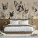 French Bulldog sketch wallpaper installed in a light-filled bedroom with wooden desk and natural accents