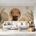 A creative home office space with the boho bulldog wall art and light oak furniture.