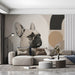 An elegant home office space featuring the artistic bulldog wallpaper pattern on a feature wall behind a desk.