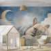 Playful dog wall art installed in a children's bedroom with soft blue decor accents