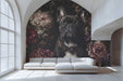 Moody hallway with a dramatic French bulldog and floral mural wallpaper.