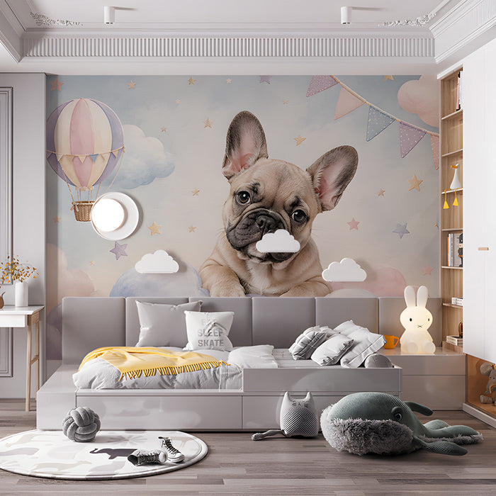 A cozy nursery featuring a whimsical dog and clouds wallpaper behind a light wood crib with soft cream bedding
