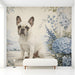 Floral dog mural installed behind a bright white reading chair in a living room