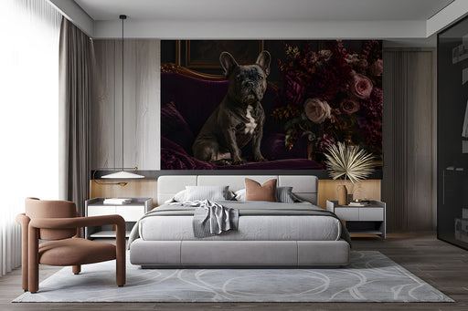 A cozy library bedroom featuring a dark moody floral wallpaper and a velvet armchair.