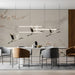 Modern office space with a crane and cherry blossom wall feature behind a walnut desk