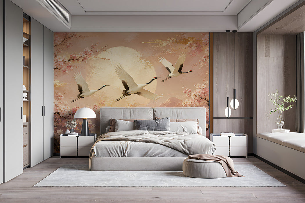 Bedroom interior with a large crane and cherry blossom mural behind a contemporary grey sofa