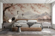 Bedroom wall mural showing a cherry blossom and crane scene above a plush bed headboard