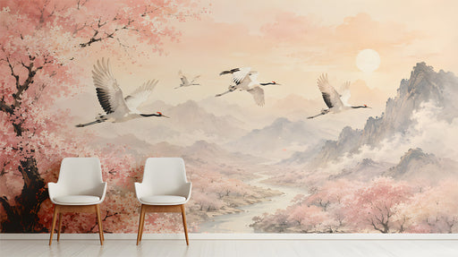 Blush pink cherry blossom landscape wallpaper installed on an entryway feature wall behind a beige sofa