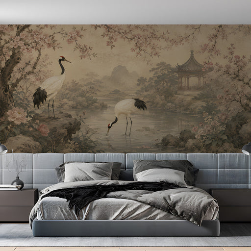 Bedroom interior featuring an oriental crane and cherry blossom mural wallpaper as a sophisticated backdrop