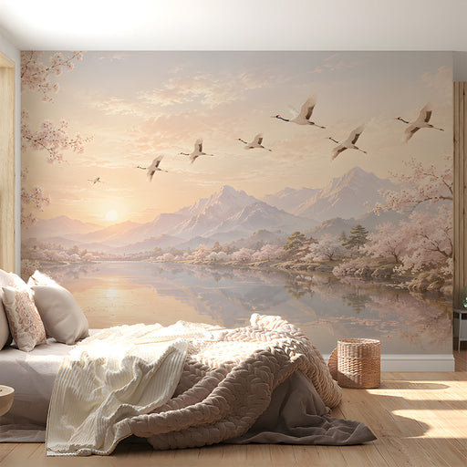 A peaceful bedroom featuring a wall mural of a sakura sunrise and flying cranes above the headboard.