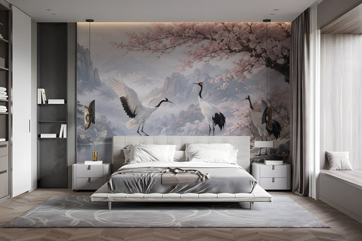 Bedroom interior featuring an expansive cherry blossom and crane landscape mural behind a modern sofa.