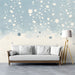 Calm blue and white speckled wall mural in a bright study or creative studio space