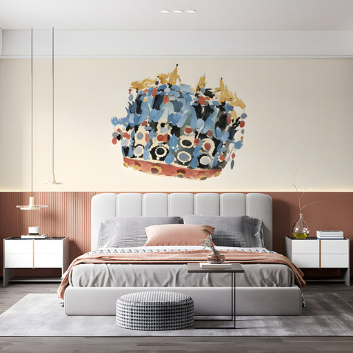 Elegant bedroom space with a hand-painted style crown mural above a mahogany desk