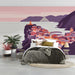 A coastal village mural installed on a feature wall in a sunlit bedroom with minimalist decor.